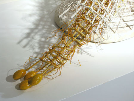 Switchback ©2010, Reed, wood, waxed linen, wood stain, lead, oil paint, 16” x 34” x 9.5”